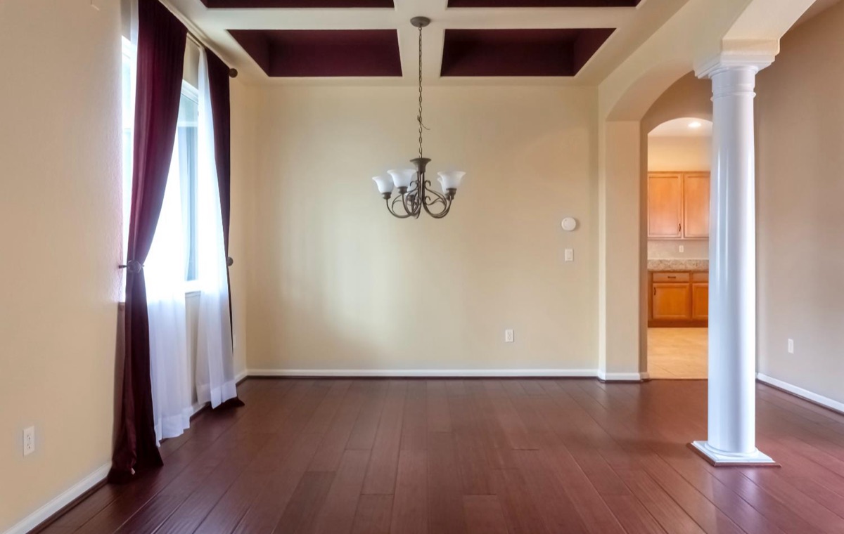 Formal dining room with coffered ceiling